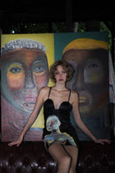 "Coincidencia?" Leather Dress - Punta Loca This paneled mini leather dress  is adorned with unique 1/1 hand-painted figures, channeling the spirit of iconic street art styles. 