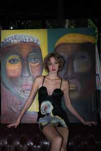 "Coincidencia?" Leather Dress - Punta Loca This paneled mini leather dress  is adorned with unique 1/1 hand-painted figures, channeling the spirit of iconic street art styles. 