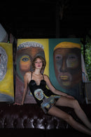 "Coincidencia?" Leather Dress - Punta Loca "Coincidencia?" Leather Dress - Punta Loca This paneled mini leather dress  is adorned with unique 1/1 hand-painted figures, channeling the spirit of iconic street art styles. 