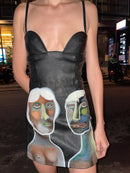 Hand-painted leather mini dress detail close-up by Basugi — Coincidencia by Punta Loca