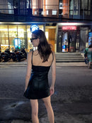 Coincidencia hand-painted leather mini dress on model, 1/1 wearable art — Punta Loca