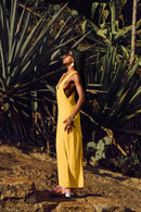 Menita maxi dress electric mustard back view, deep V back — Punta Loca