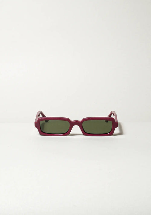 Singularidad burgundy sunglasses, sculptural Italian eyewear handmade in recycled acetate — Punta Loca